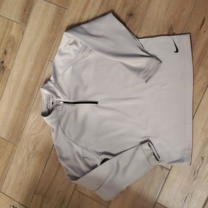 Boy's size medium Nike Golf 1/4 zip pull over jacket. Lightly Lined.